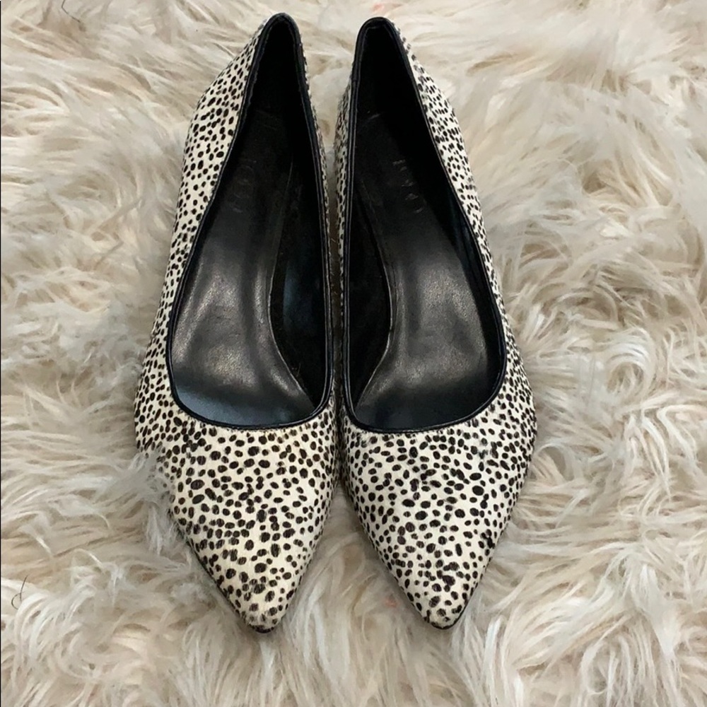 Black and white pointed low heels!